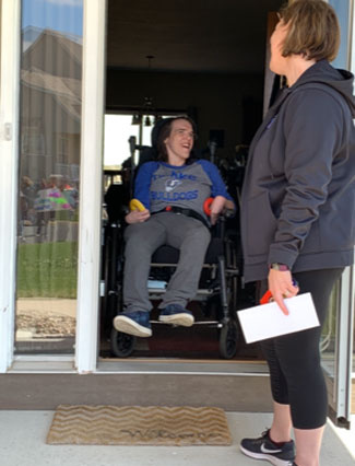 Sam was all smiles when she saw ProAct staff at her house!